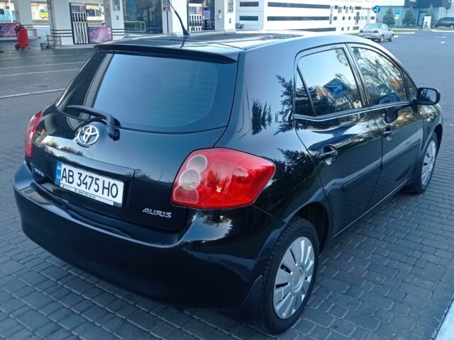 Черный Тойота Аурис, объемом двигателя 1.6 л и пробегом 236 тыс. км за 5900 $, фото 2 на Automoto.ua