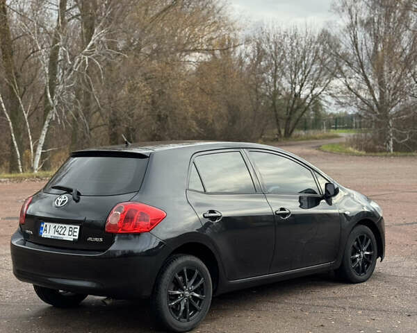 Черный Тойота Аурис, объемом двигателя 1.6 л и пробегом 301 тыс. км за 5999 $, фото 5 на Automoto.ua