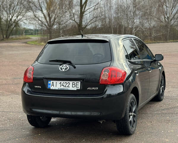 Чорний Тойота Ауріс, об'ємом двигуна 1.6 л та пробігом 301 тис. км за 5500 $, фото 5 на Automoto.ua