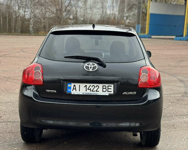 Черный Тойота Аурис, объемом двигателя 1.6 л и пробегом 301 тыс. км за 5999 $, фото 7 на Automoto.ua