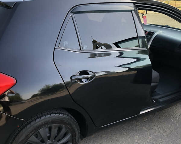 Черный Тойота Аурис, объемом двигателя 1.4 л и пробегом 272 тыс. км за 5900 $, фото 5 на Automoto.ua