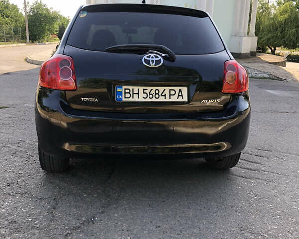 Черный Тойота Аурис, объемом двигателя 1.4 л и пробегом 272 тыс. км за 5900 $, фото 7 на Automoto.ua