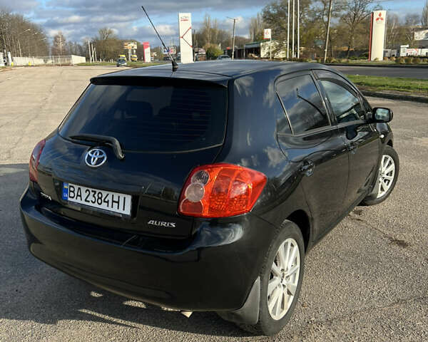 Чорний Тойота Ауріс, об'ємом двигуна 1.6 л та пробігом 115 тис. км за 7800 $, фото 4 на Automoto.ua