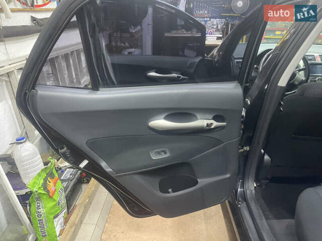 Чорний Тойота Ауріс, об'ємом двигуна 1.6 л та пробігом 192 тис. км за 5850 $, фото 5 на Automoto.ua