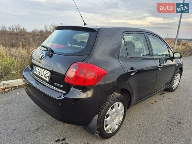 Черный Тойота Аурис, объемом двигателя 1.6 л и пробегом 134 тыс. км за 6900 $, фото 5 на Automoto.ua
