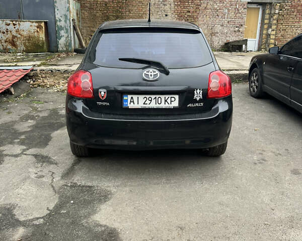 Черный Тойота Аурис, объемом двигателя 1.8 л и пробегом 234 тыс. км за 6100 $, фото 1 на Automoto.ua
