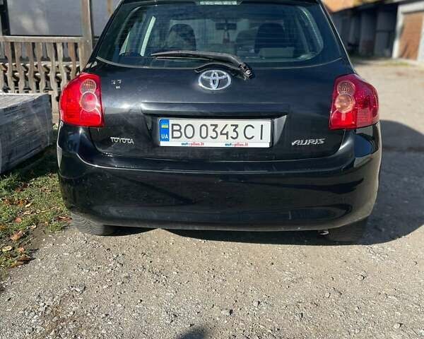 Чорний Тойота Ауріс, об'ємом двигуна 1.36 л та пробігом 380 тис. км за 5700 $, фото 1 на Automoto.ua