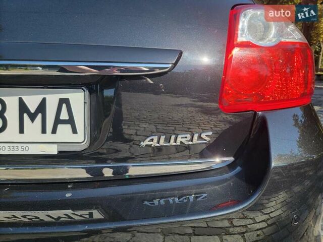 Черный Тойота Аурис, объемом двигателя 1.6 л и пробегом 169 тыс. км за 10800 $, фото 7 на Automoto.ua