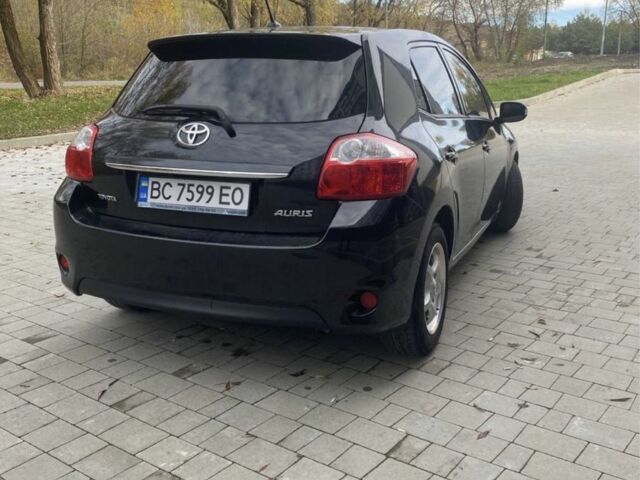 Черный Тойота Аурис, объемом двигателя 1.4 л и пробегом 280 тыс. км за 5700 $, фото 1 на Automoto.ua