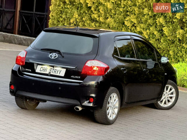 Черный Тойота Аурис, объемом двигателя 1.6 л и пробегом 184 тыс. км за 8999 $, фото 24 на Automoto.ua