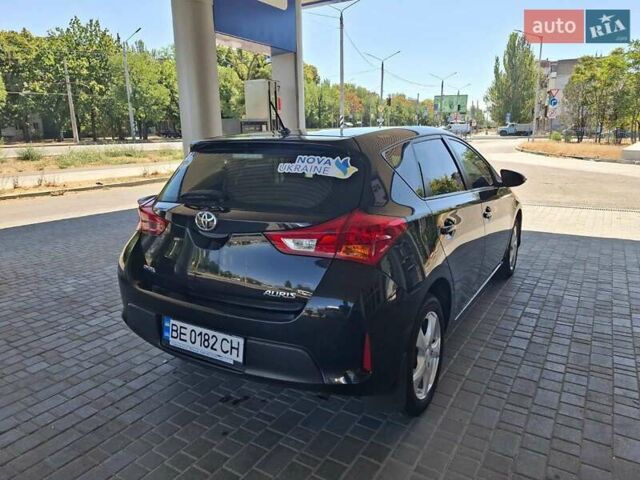 Чорний Тойота Ауріс, об'ємом двигуна 1.33 л та пробігом 129 тис. км за 9300 $, фото 7 на Automoto.ua