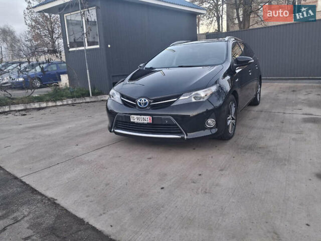 Черный Тойота Аурис, объемом двигателя 1.8 л и пробегом 169 тыс. км за 13999 $, фото 1 на Automoto.ua