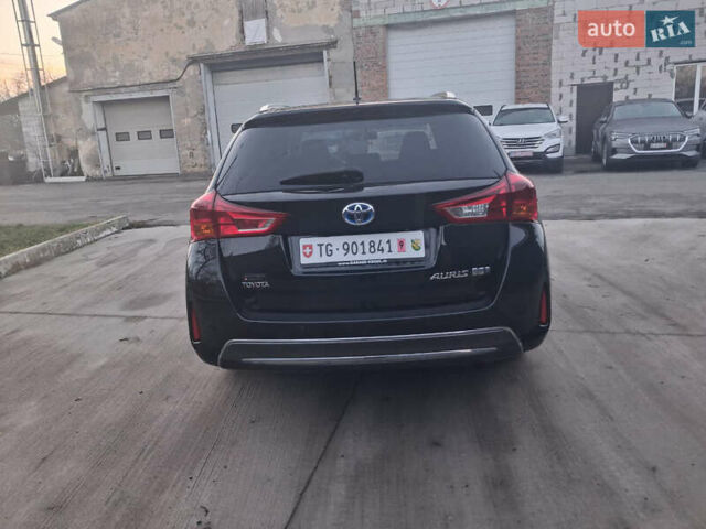 Черный Тойота Аурис, объемом двигателя 1.8 л и пробегом 169 тыс. км за 13999 $, фото 3 на Automoto.ua