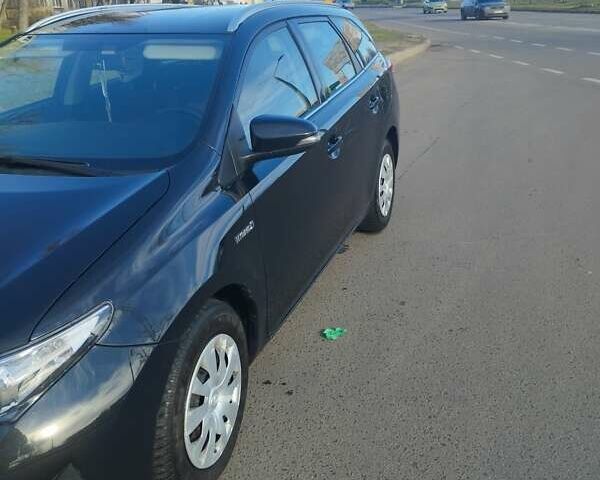 Черный Тойота Аурис, объемом двигателя 1.8 л и пробегом 196 тыс. км за 10200 $, фото 1 на Automoto.ua