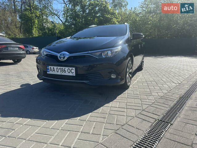 Черный Тойота Аурис, объемом двигателя 1.8 л и пробегом 233 тыс. км за 12500 $, фото 1 на Automoto.ua