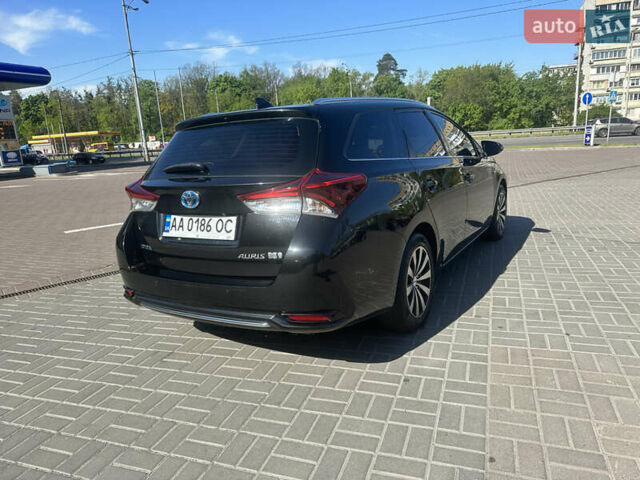 Черный Тойота Аурис, объемом двигателя 1.8 л и пробегом 233 тыс. км за 12500 $, фото 7 на Automoto.ua
