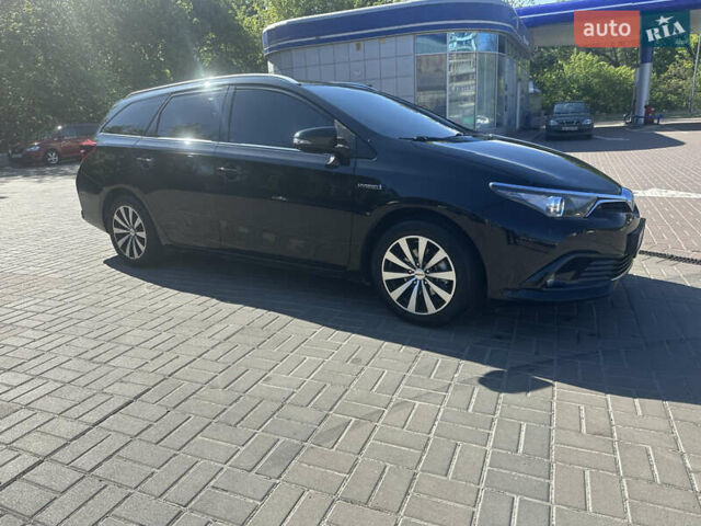 Черный Тойота Аурис, объемом двигателя 1.8 л и пробегом 233 тыс. км за 12500 $, фото 3 на Automoto.ua