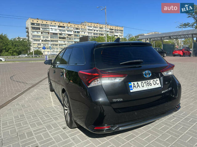 Черный Тойота Аурис, объемом двигателя 1.8 л и пробегом 233 тыс. км за 12500 $, фото 9 на Automoto.ua