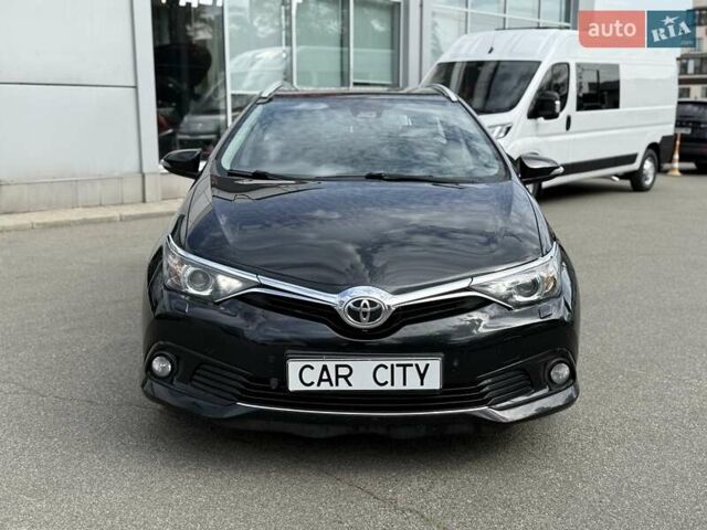 Черный Тойота Аурис, объемом двигателя 1.8 л и пробегом 165 тыс. км за 15500 $, фото 1 на Automoto.ua