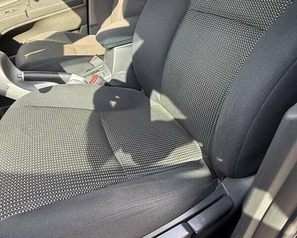 Фиолетовый Тойота Аурис, объемом двигателя 1.6 л и пробегом 146 тыс. км за 11000 $, фото 15 на Automoto.ua