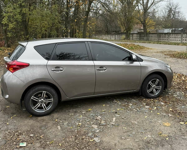 Коричневый Тойота Аурис, объемом двигателя 1.33 л и пробегом 105 тыс. км за 9800 $, фото 23 на Automoto.ua