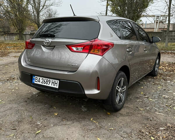 Коричневый Тойота Аурис, объемом двигателя 1.33 л и пробегом 105 тыс. км за 9800 $, фото 24 на Automoto.ua