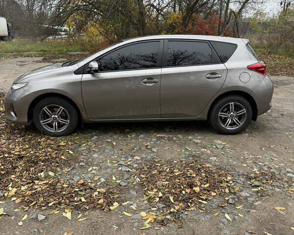 Коричневый Тойота Аурис, объемом двигателя 1.33 л и пробегом 105 тыс. км за 9800 $, фото 27 на Automoto.ua