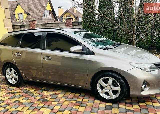 Коричневий Тойота Ауріс, об'ємом двигуна 1.36 л та пробігом 196 тис. км за 8999 $, фото 1 на Automoto.ua