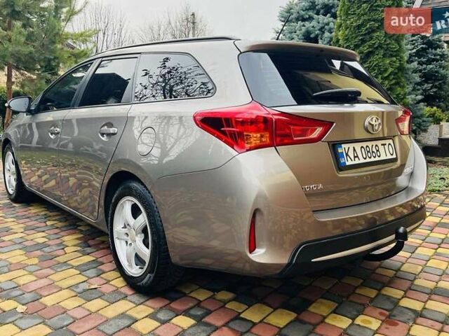 Коричневий Тойота Ауріс, об'ємом двигуна 1.36 л та пробігом 196 тис. км за 8999 $, фото 5 на Automoto.ua