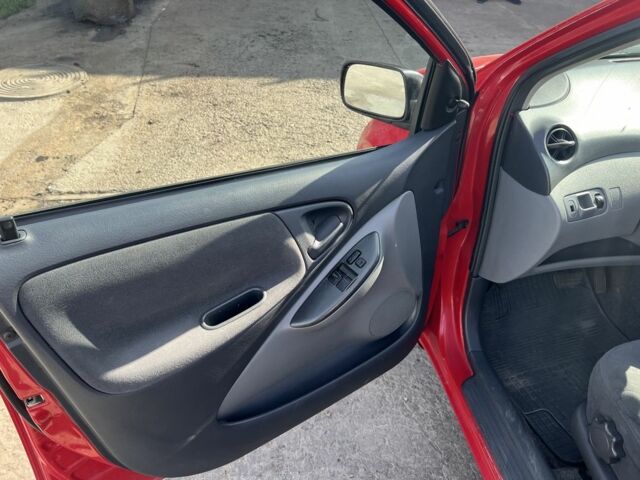 Червоний Тойота Ауріс, об'ємом двигуна 1.3 л та пробігом 245 тис. км за 4000 $, фото 5 на Automoto.ua