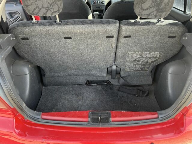 Червоний Тойота Ауріс, об'ємом двигуна 1.3 л та пробігом 245 тис. км за 4000 $, фото 18 на Automoto.ua