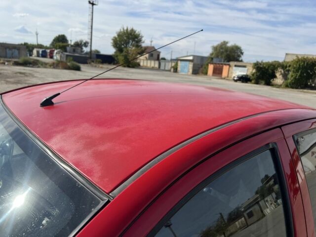 Червоний Тойота Ауріс, об'ємом двигуна 1.3 л та пробігом 245 тис. км за 4000 $, фото 6 на Automoto.ua