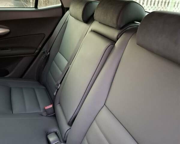 Красный Тойота Аурис, объемом двигателя 1.6 л и пробегом 196 тыс. км за 6800 $, фото 7 на Automoto.ua