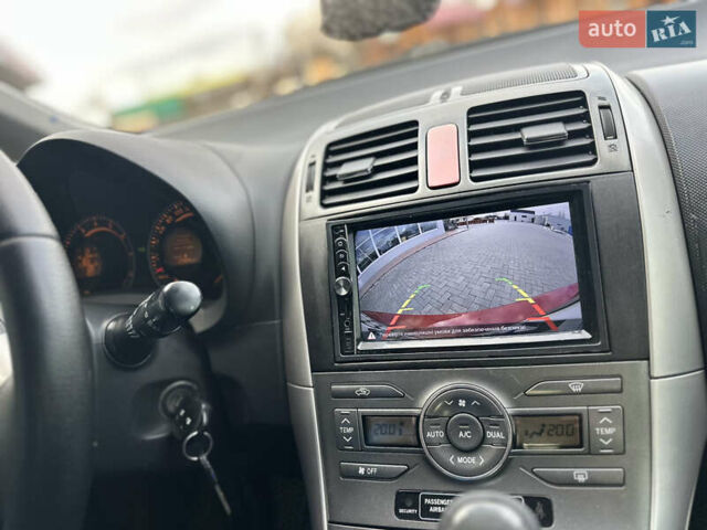 Красный Тойота Аурис, объемом двигателя 1.6 л и пробегом 193 тыс. км за 6855 $, фото 13 на Automoto.ua