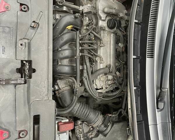 Красный Тойота Аурис, объемом двигателя 1.6 л и пробегом 313 тыс. км за 5300 $, фото 12 на Automoto.ua