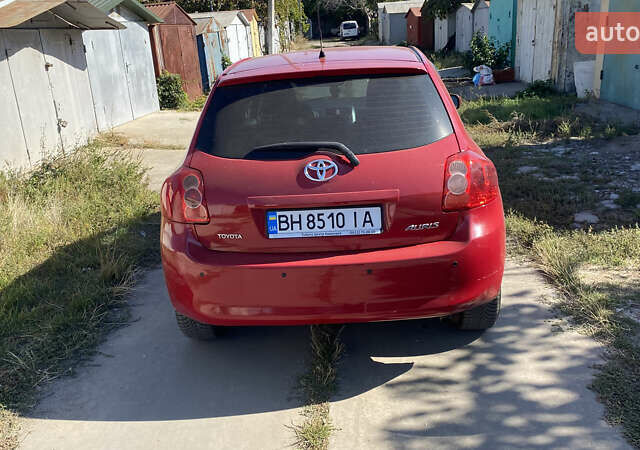 Красный Тойота Аурис, объемом двигателя 1.6 л и пробегом 170 тыс. км за 6500 $, фото 12 на Automoto.ua