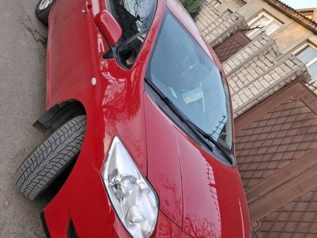 Красный Тойота Аурис, объемом двигателя 1.6 л и пробегом 196 тыс. км за 6800 $, фото 1 на Automoto.ua