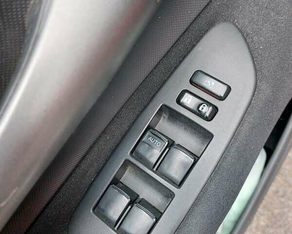 Червоний Тойота Ауріс, об'ємом двигуна 1.6 л та пробігом 243 тис. км за 6900 $, фото 11 на Automoto.ua