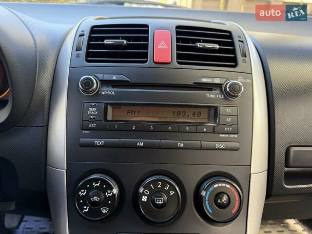 Червоний Тойота Ауріс, об'ємом двигуна 1.4 л та пробігом 220 тис. км за 7000 $, фото 46 на Automoto.ua