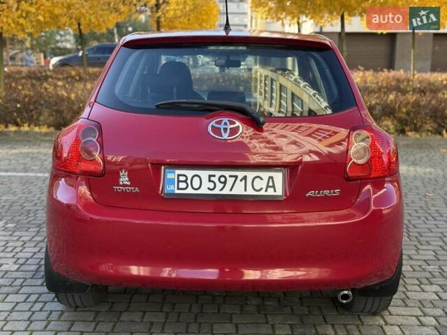 Червоний Тойота Ауріс, об'ємом двигуна 1.4 л та пробігом 220 тис. км за 7000 $, фото 13 на Automoto.ua