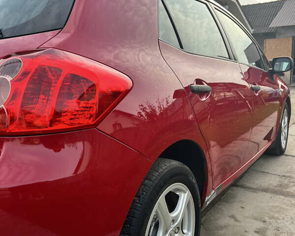 Червоний Тойота Ауріс, об'ємом двигуна 1.36 л та пробігом 229 тис. км за 6300 $, фото 9 на Automoto.ua