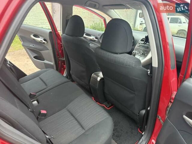 Червоний Тойота Ауріс, об'ємом двигуна 1.6 л та пробігом 176 тис. км за 7200 $, фото 8 на Automoto.ua