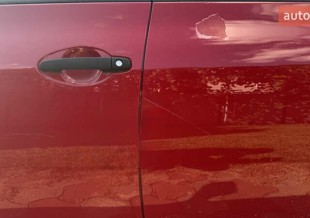 Красный Тойота Аурис, объемом двигателя 1.33 л и пробегом 210 тыс. км за 5300 $, фото 6 на Automoto.ua