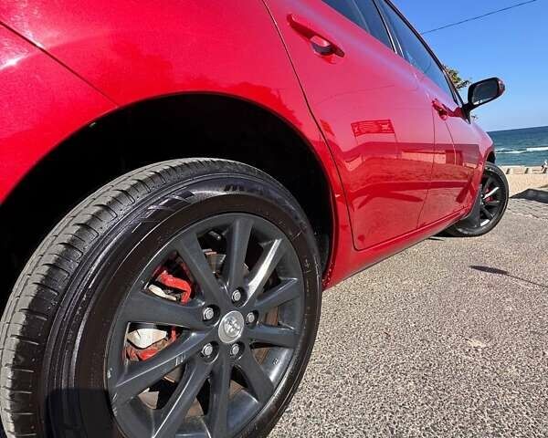 Червоний Тойота Ауріс, об'ємом двигуна 1.6 л та пробігом 219 тис. км за 9700 $, фото 16 на Automoto.ua