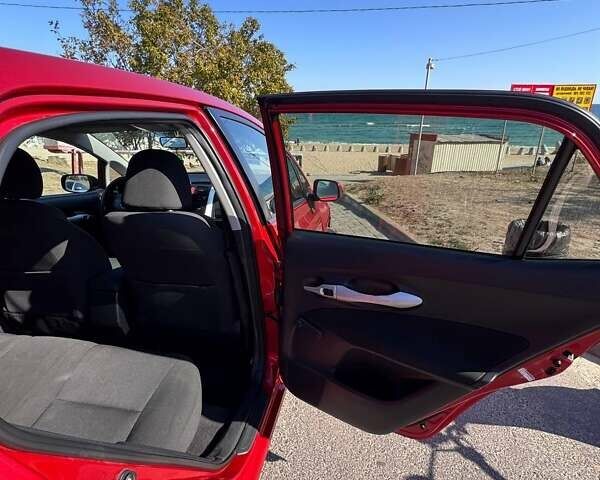 Червоний Тойота Ауріс, об'ємом двигуна 1.6 л та пробігом 219 тис. км за 9700 $, фото 14 на Automoto.ua