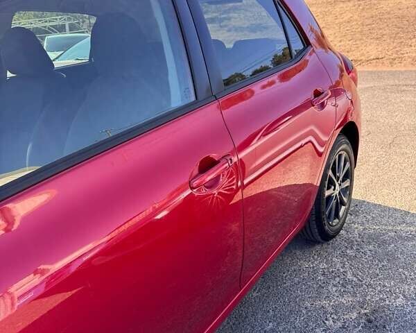 Червоний Тойота Ауріс, об'ємом двигуна 1.6 л та пробігом 219 тис. км за 9700 $, фото 5 на Automoto.ua