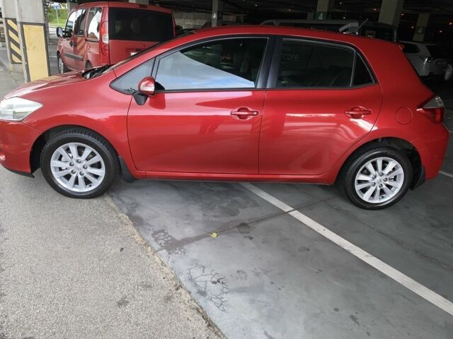 Красный Тойота Аурис, объемом двигателя 1.6 л и пробегом 127 тыс. км за 9900 $, фото 1 на Automoto.ua