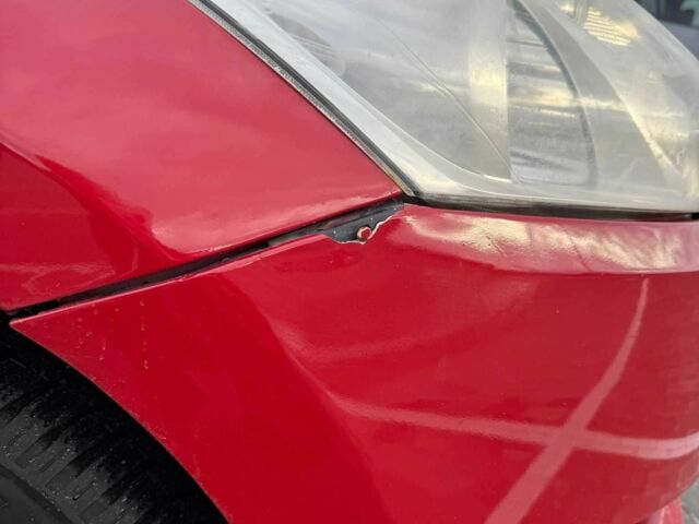 Червоний Тойота Ауріс, об'ємом двигуна 1.6 л та пробігом 238 тис. км за 5500 $, фото 6 на Automoto.ua