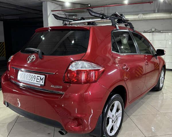 Красный Тойота Аурис, объемом двигателя 1.6 л и пробегом 182 тыс. км за 9499 $, фото 12 на Automoto.ua
