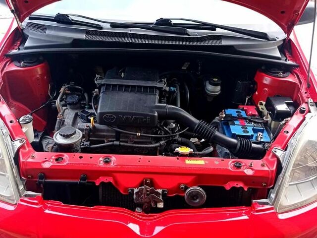 Червоний Тойота Ауріс, об'ємом двигуна 1 л та пробігом 165 тис. км за 3250 $, фото 3 на Automoto.ua